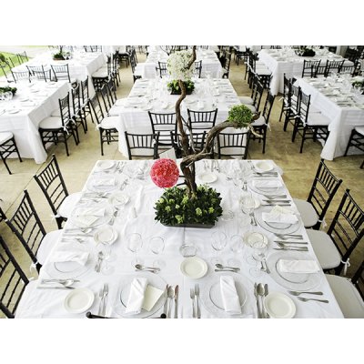 Back Chiavari chairs at event tables